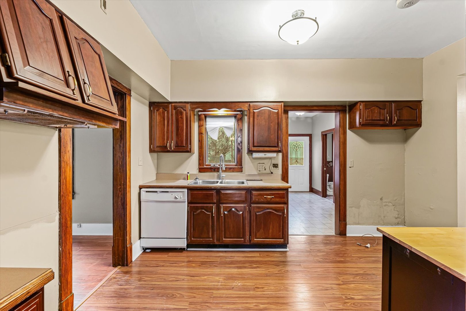 113 Columbus Street Sibley, IL 61773 - Photo 13 of 39 a kitchen with stainless steel appliances granite countertop a refrigerator a stove and a sink