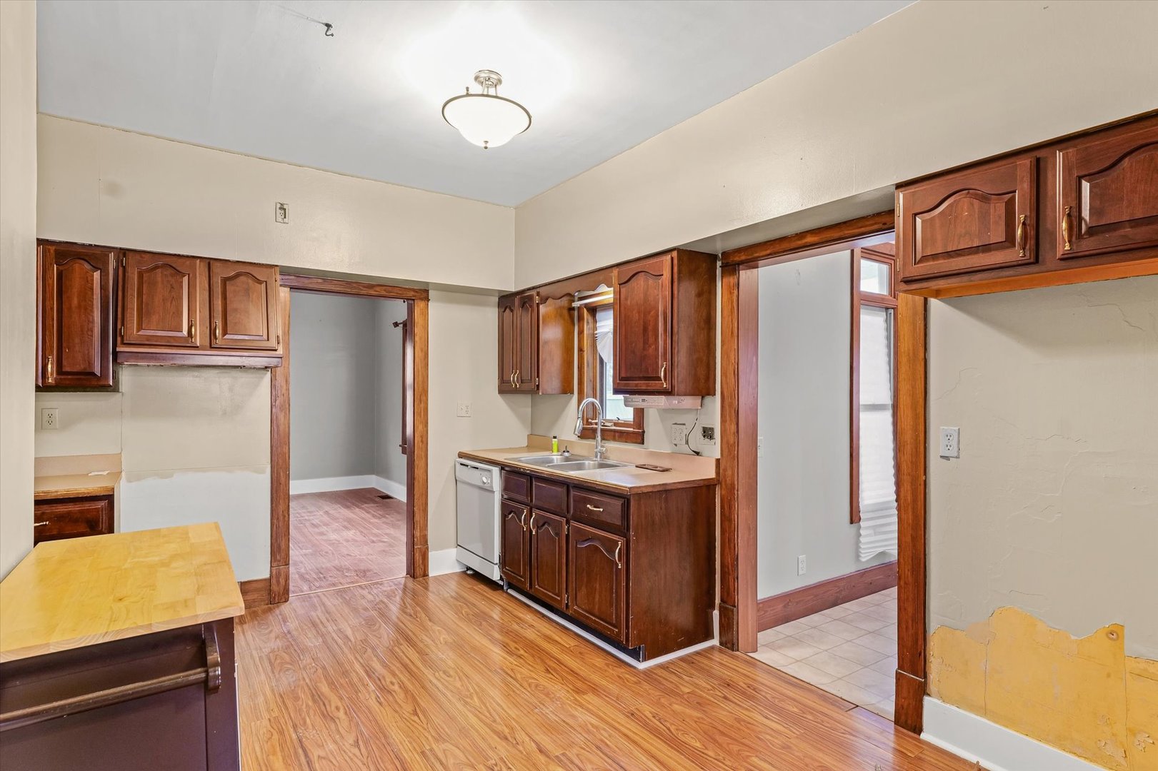 113 Columbus Street Sibley, IL 61773 - Photo 16 of 39 a bathroom with a granite countertop sink a mirror and shower