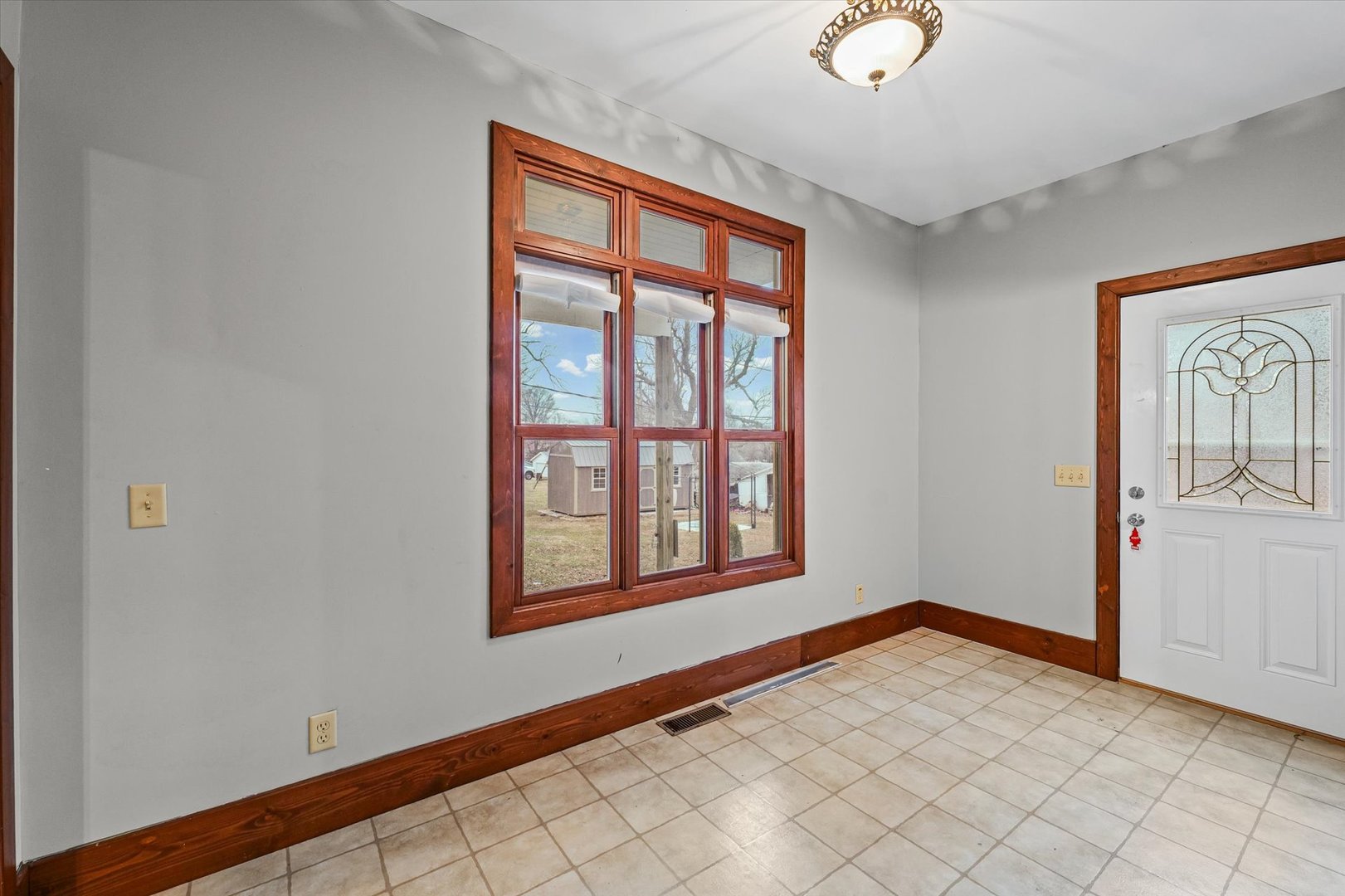113 Columbus Street Sibley, IL 61773 - Photo 21 of 39 an empty room with windows