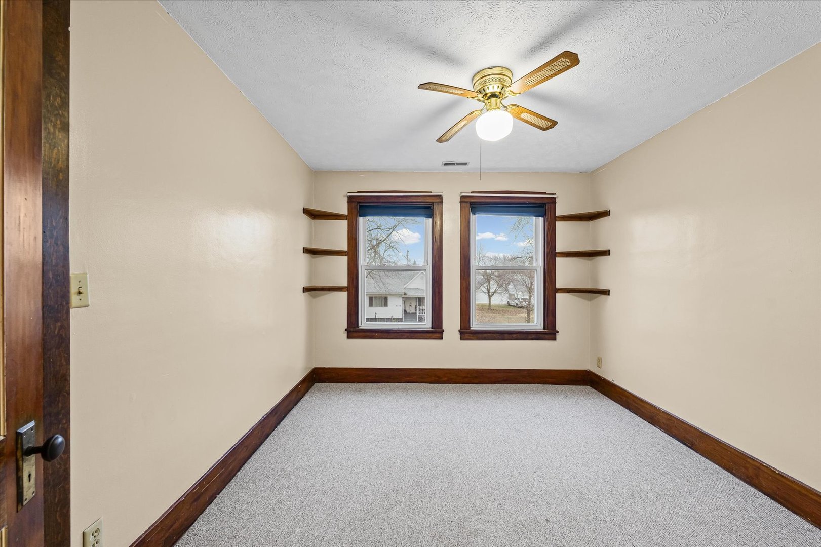 113 Columbus Street Sibley, IL 61773 - Photo 26 of 39 wooden floor in an empty room with a window