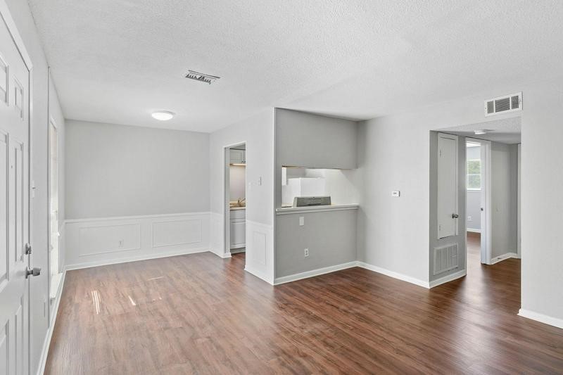 932 7th Avenue North, Unit 6 Texas City, TX 77590 - Photo 8 of 8 a view of empty room with wooden floor