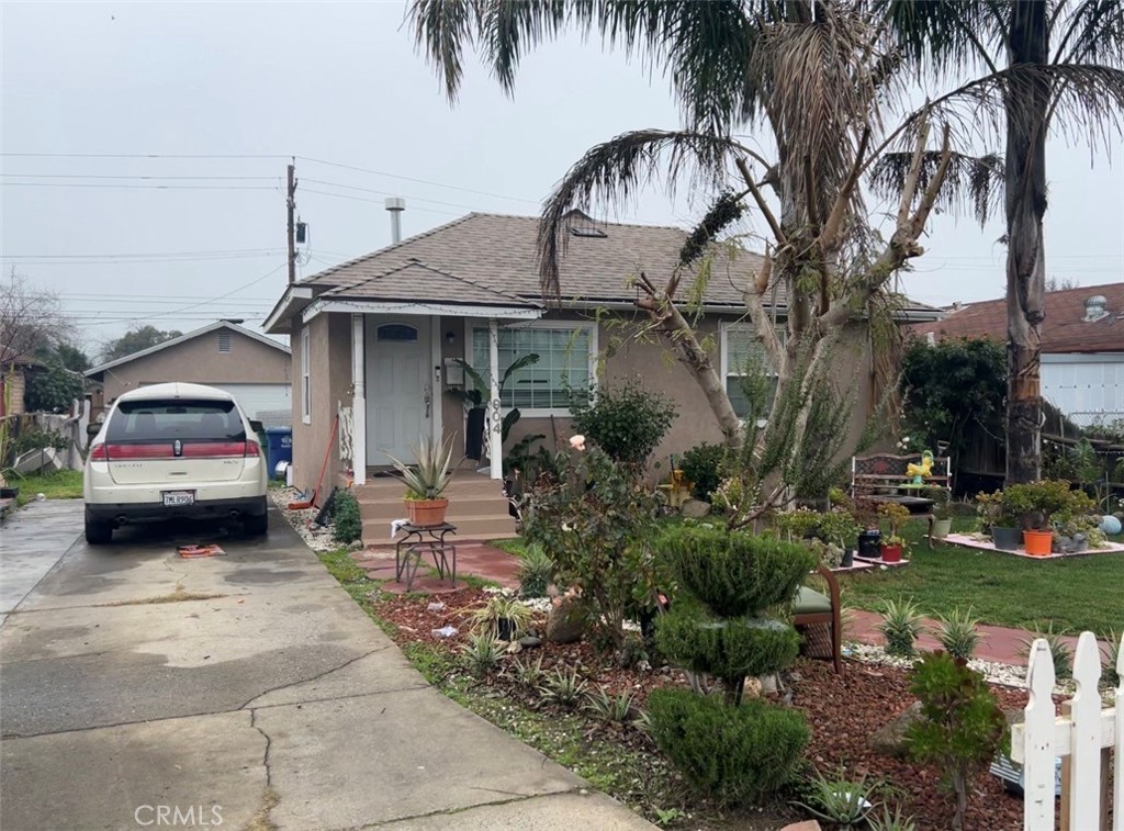a house view with a garden space