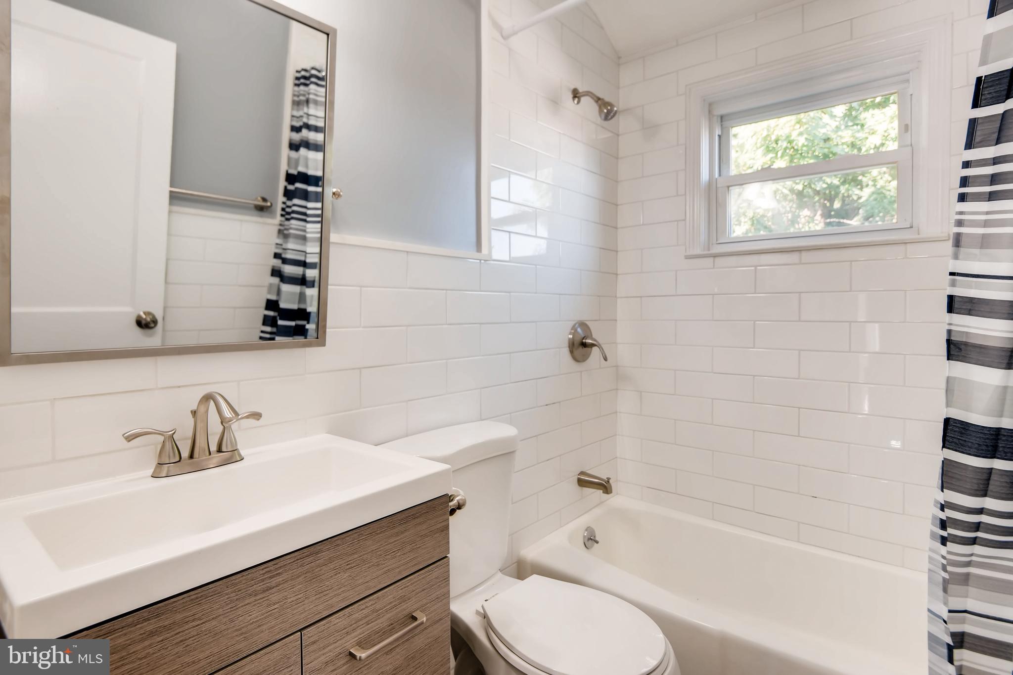 166 Bennett Road Baltimore, MD 21221 - Photo 13 of 23 Master BA on upper level w/ new tile