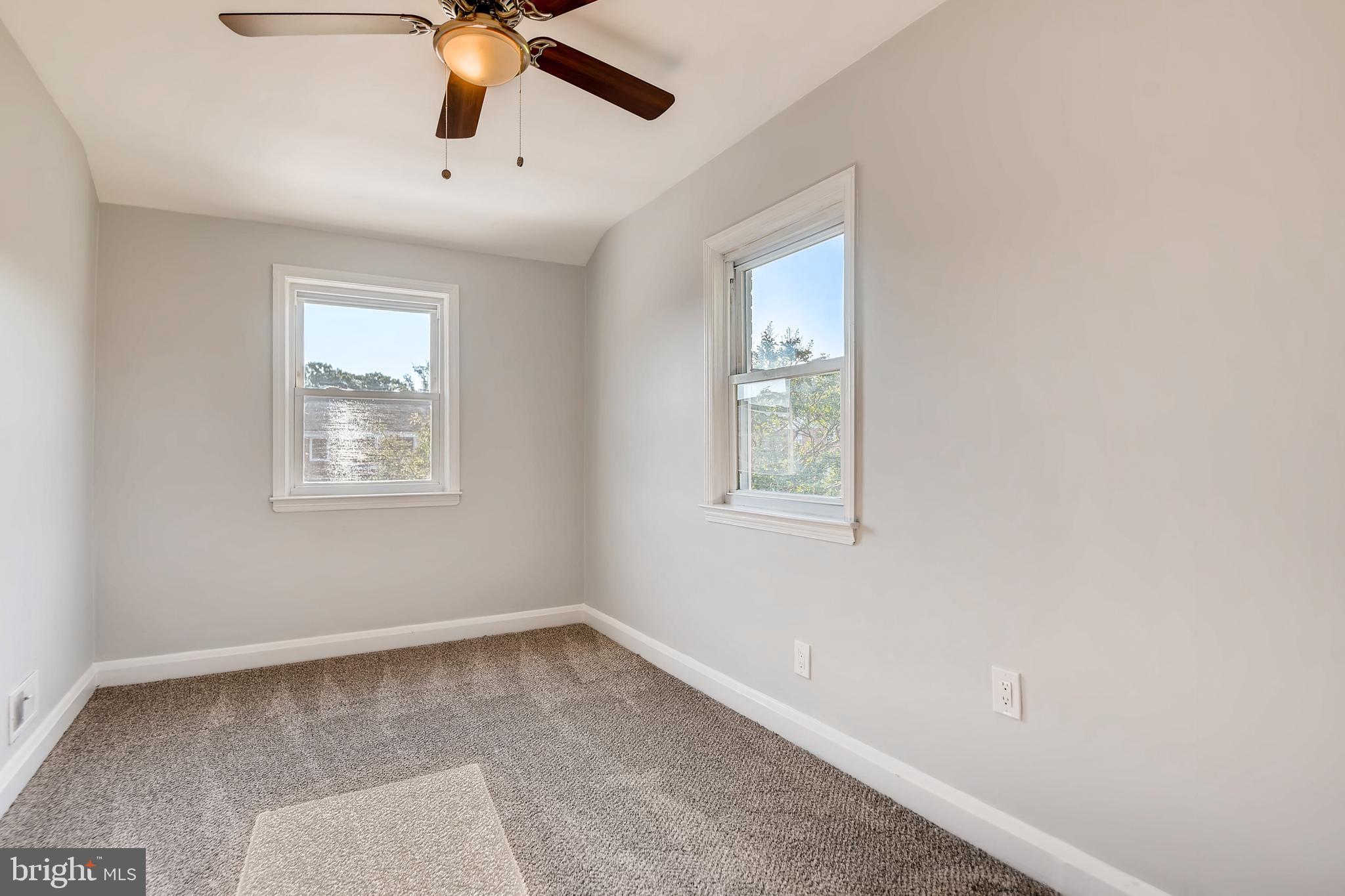 166 Bennett Road Baltimore, MD 21221 - Photo 15 of 23 2nd BR with ceiling fan and lots of windows