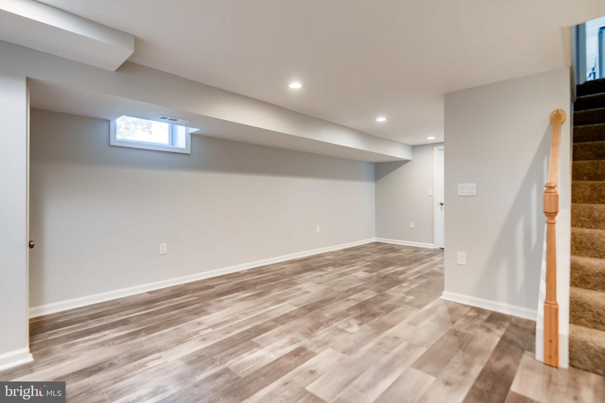 166 Bennett Road Baltimore, MD 21221 - Photo 18 of 23 Recessed lighting and windows