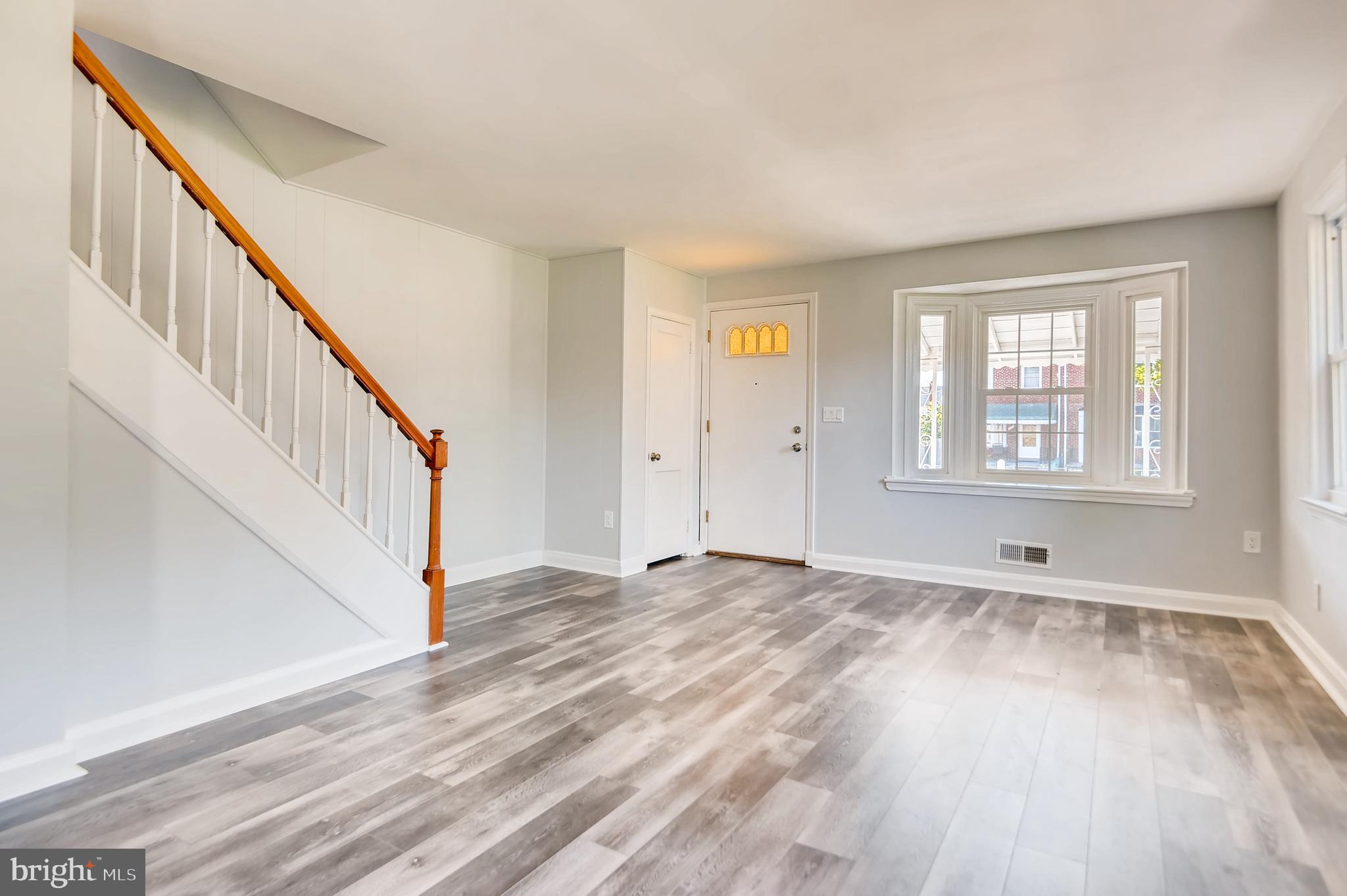 166 Bennett Road Baltimore, MD 21221 - Photo 3 of 23 Large bay windows on main level