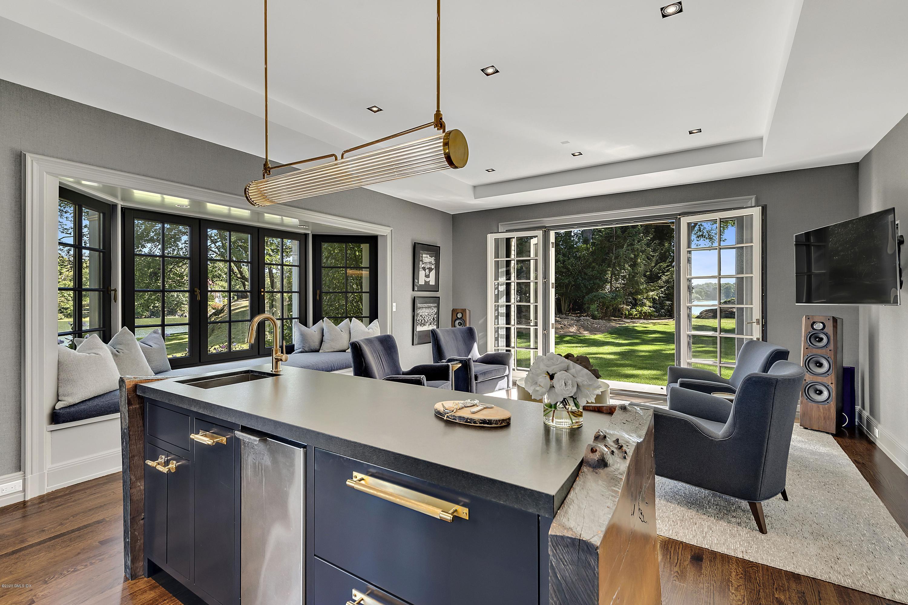 16 Chimney Corner Lane Greenwich, CT 06830 - Photo 14 of 39 a view of a dining room with furniture window and outside view
