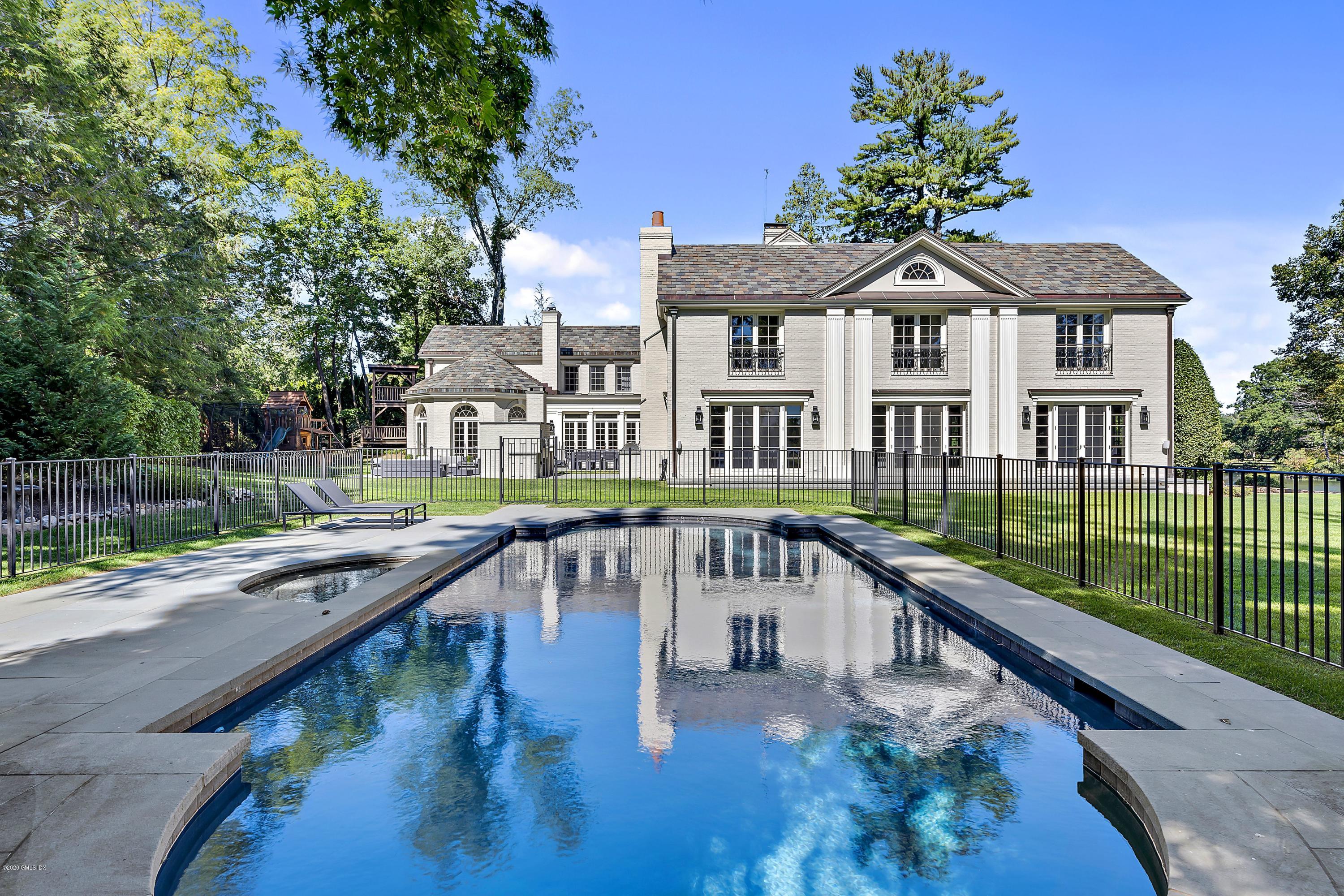 16 Chimney Corner Lane Greenwich, CT 06830 - Photo 34 of 39 a view of a city from a balcony