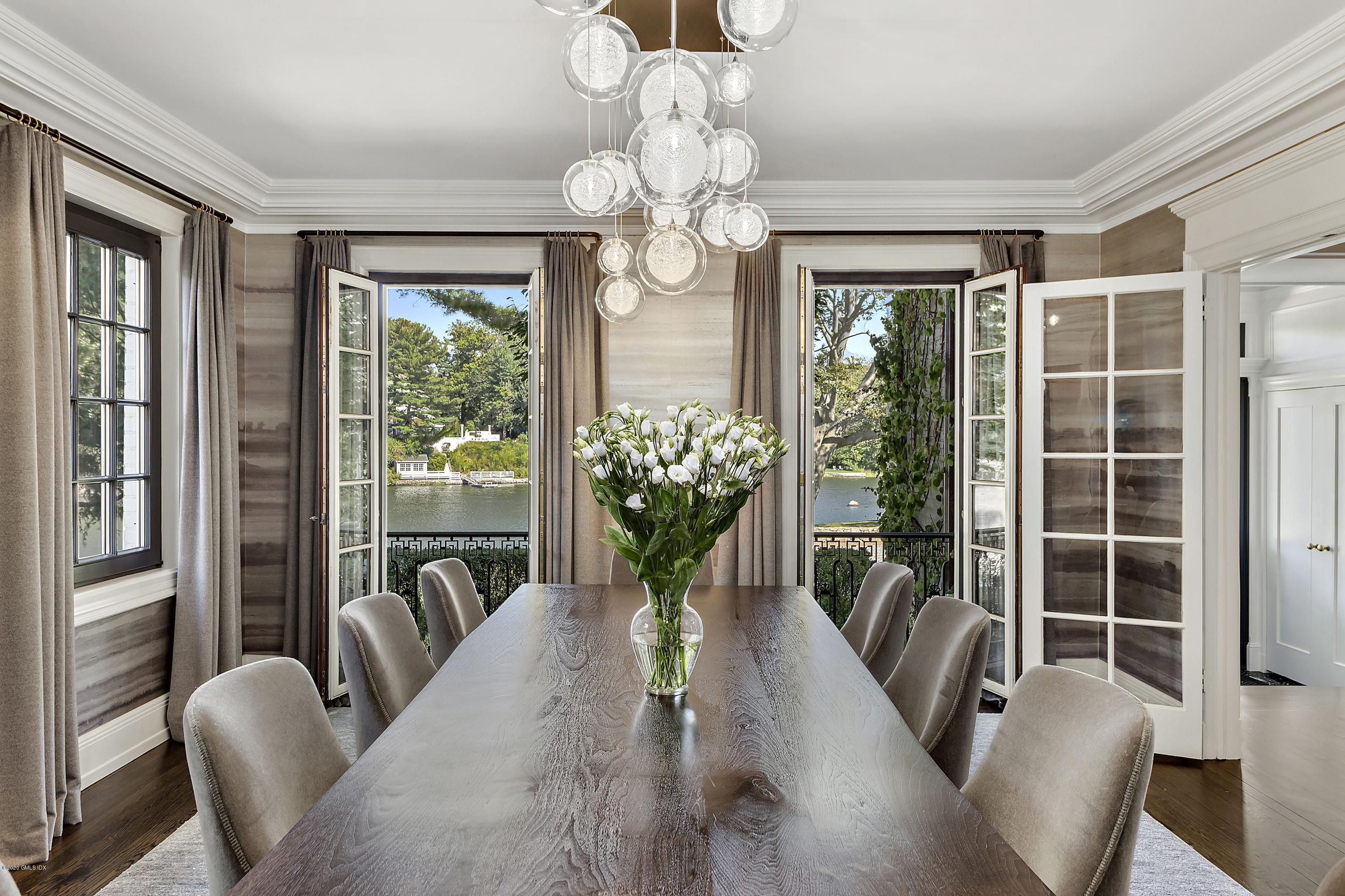 16 Chimney Corner Lane Greenwich, CT 06830 - Photo 7 of 39 a view of a dining room with furniture a livingroom and chandelier