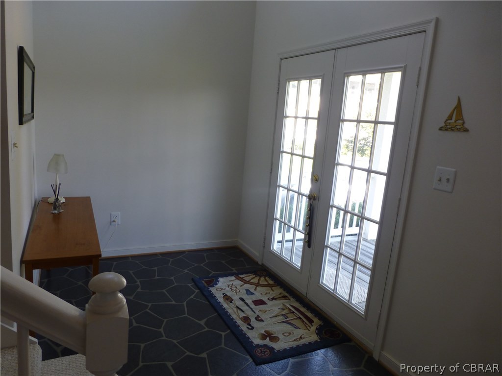 464 Jackson Creek Road Deltaville, VA 23043 - Photo 16 of 26 Entrance foyer - double french doors - lots of light, vaulted up to second floor.