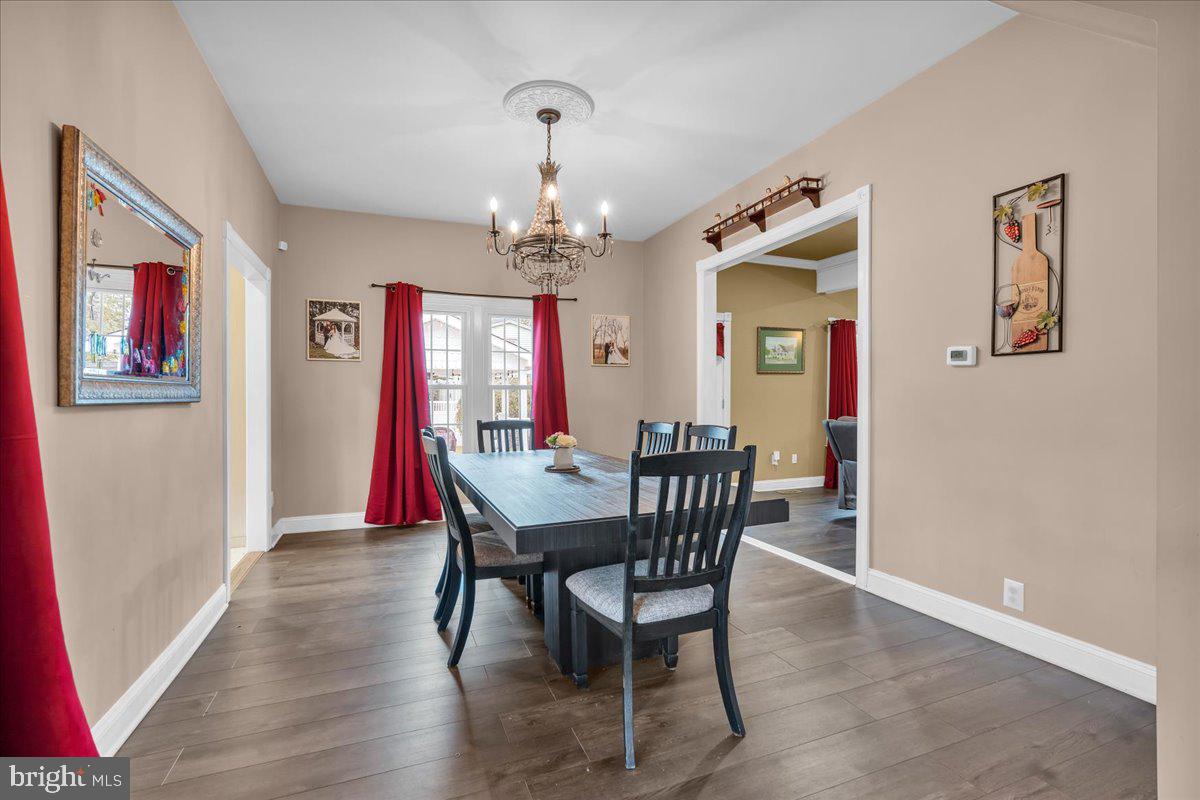 130 East Hancock Street Riverside, NJ 08075 - Photo 8 of 28 Elegant dining space with rich decor.