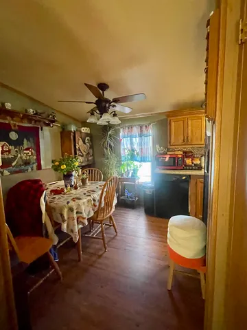 a view of a entryway with furniture and front door