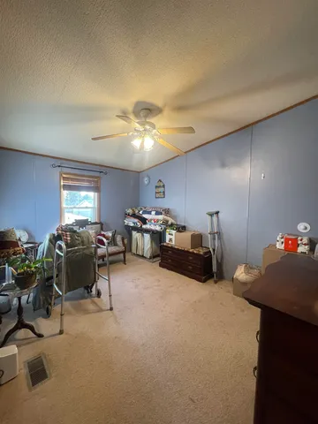 a bathroom with a double vanity sink toilet and shower