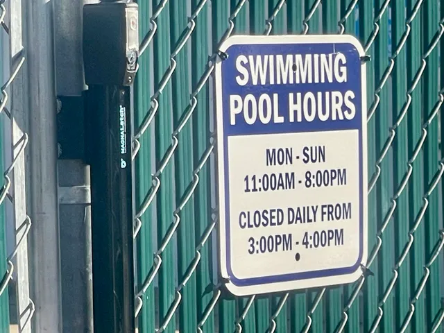 a view of a street with a park