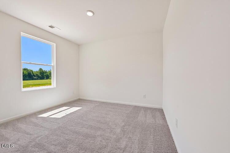 10955 Lancaster Store Road Castalia, NC 27816 - Photo 7 of 20 an empty room with windows