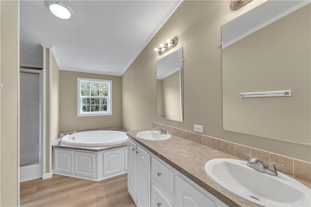 12082 State Highway Walton, NY 13856 - Photo 17 of 28 Primary bath with soaking tub, shower and 2 sink vanity