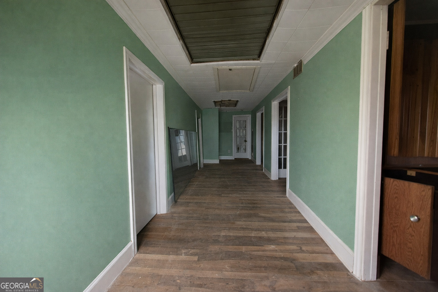 251 Dewey McGlamry Road Fitzgerald, GA 31750 - Photo 6 of 13 a view of a hallway