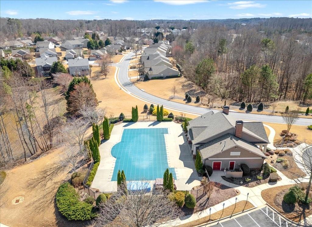 5015 Kings Common Way Cumming, GA 30040 - Photo 20 of 22 an aerial view of residential houses with outdoor space