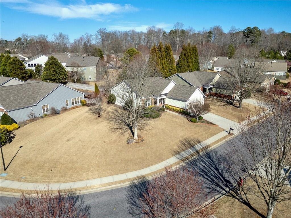 5015 Kings Common Way Cumming, GA 30040 - Photo 2 of 22 a view of a house with a yard