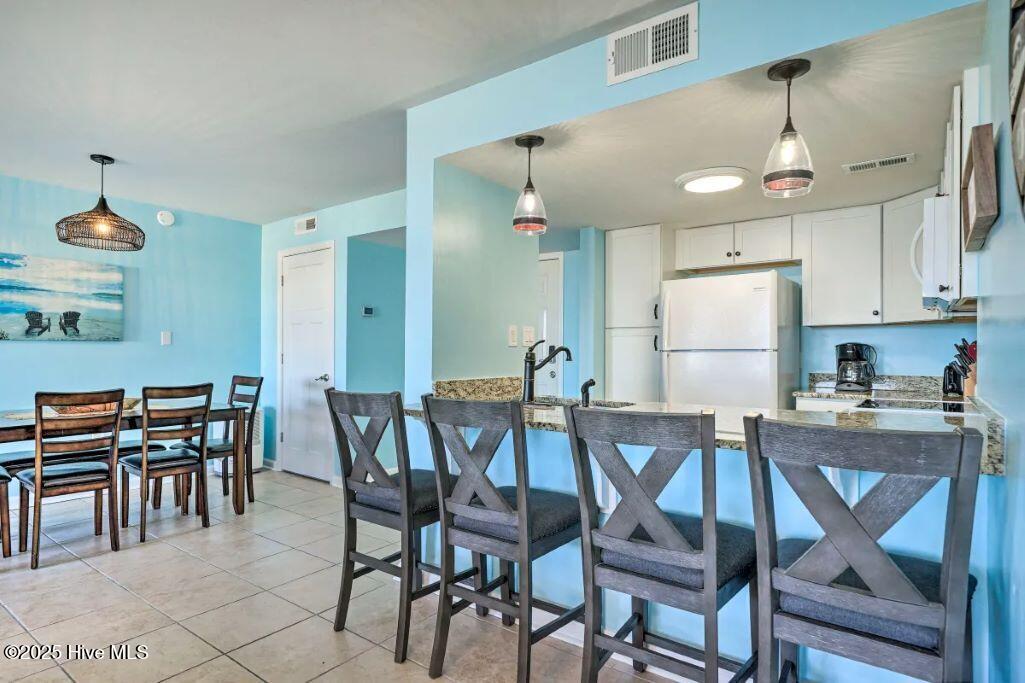 2000 New River Inlet Road, Unit 3209 North Topsail Beach, NC 28460 - Photo 8 of 44 dining