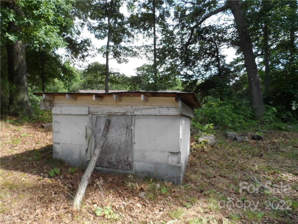 1184 Wilma Sigmon Road Lincolnton, NC 28092 - Photo 12 of 15 a view of a small house and a yard