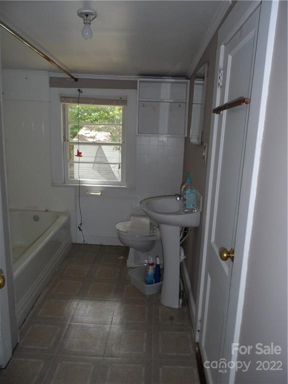 1184 Wilma Sigmon Road Lincolnton, NC 28092 - Photo 8 of 15 a bathroom with a sink toilet and shower