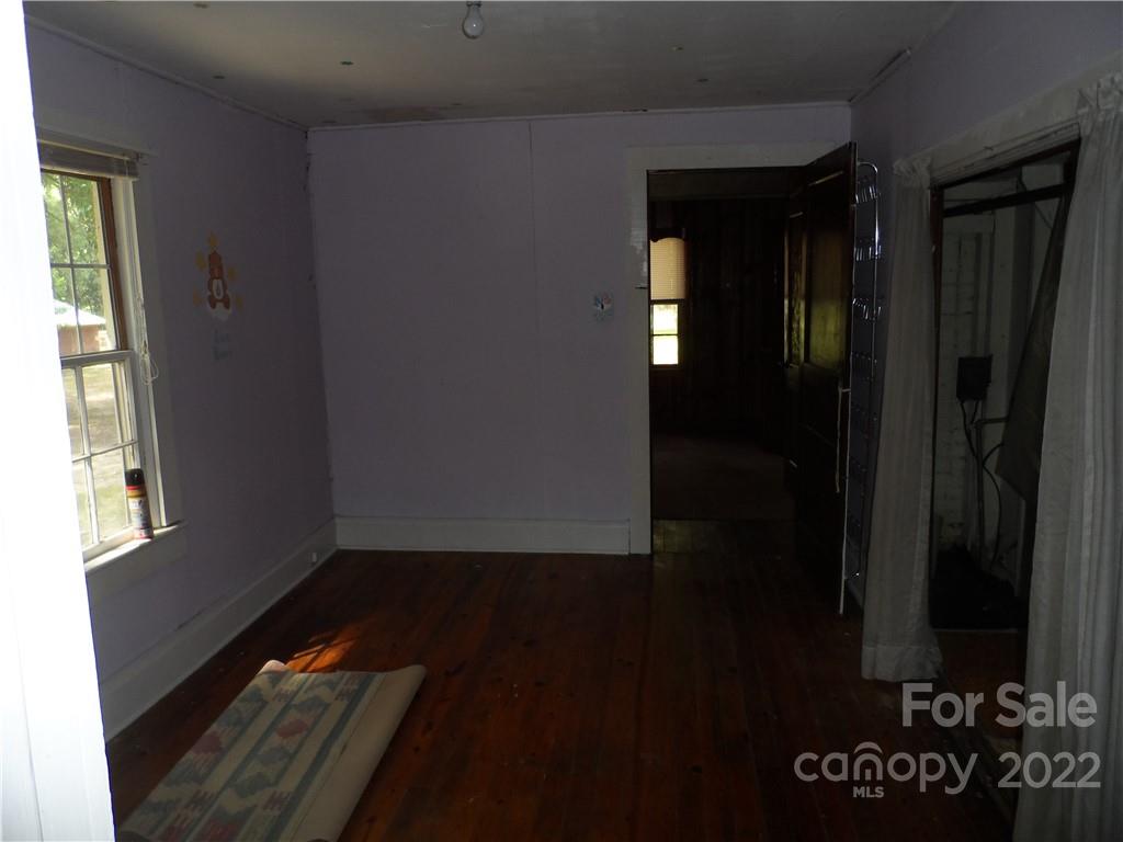 1184 Wilma Sigmon Road Lincolnton, NC 28092 - Photo 9 of 15 a view of hallway with wooden floor