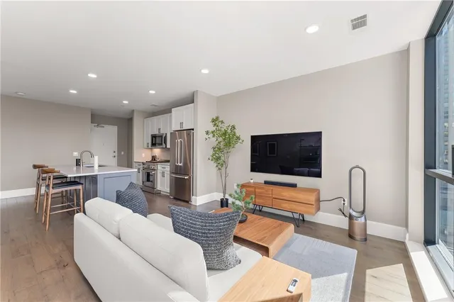 a living room with furniture and a couch