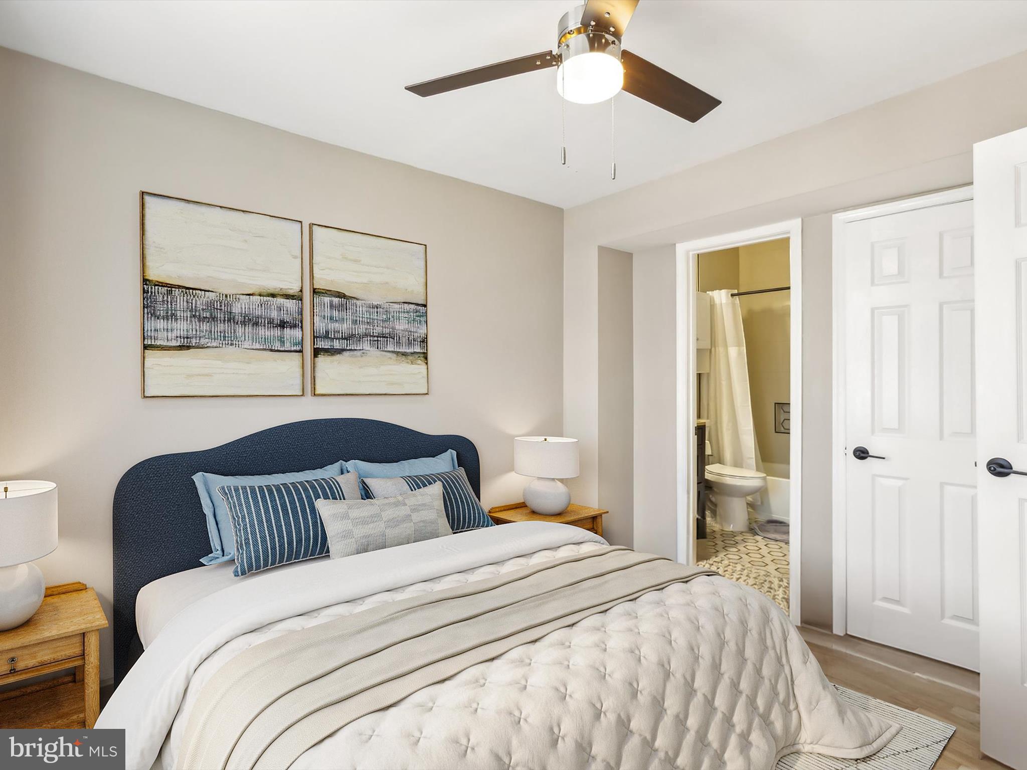 1710 West Virginia Avenue Northeast Washington, DC 20002 - Photo 16 of 36 a bedroom with a bed and a painting on the wall