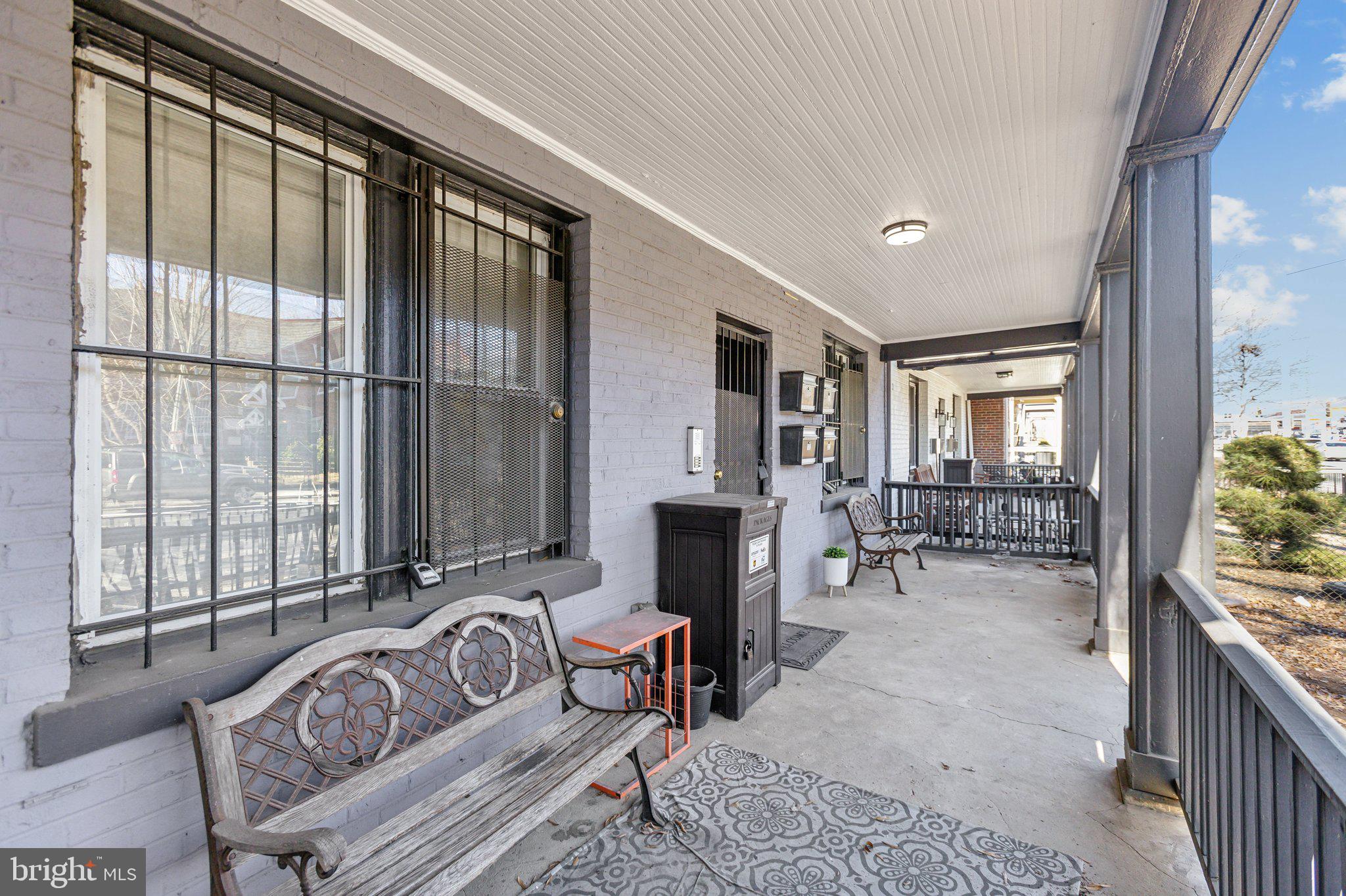 1710 West Virginia Avenue Northeast Washington, DC 20002 - Photo 26 of 36 a bedroom with furniture and a large window