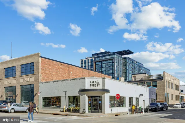 a view of a building with a street