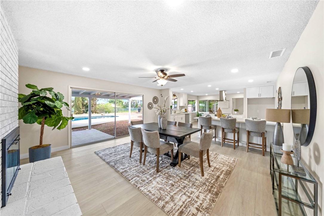 33140 Chaney Road Menifee, CA 92584 - Photo 1 of 1 a living room with furniture a potted plant and a large window
