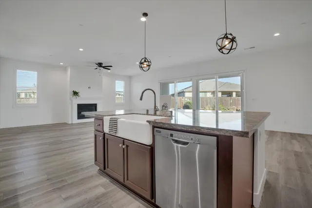 a spacious bathroom with a bathtub sink double and mirror