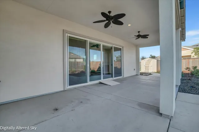 an aerial view of a house with a garden and plants