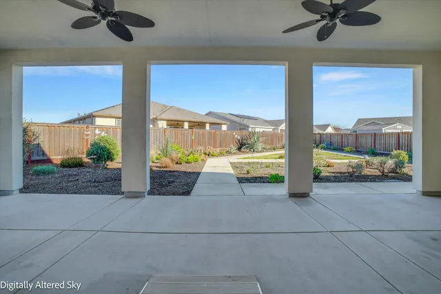 an aerial view of a house with a garden