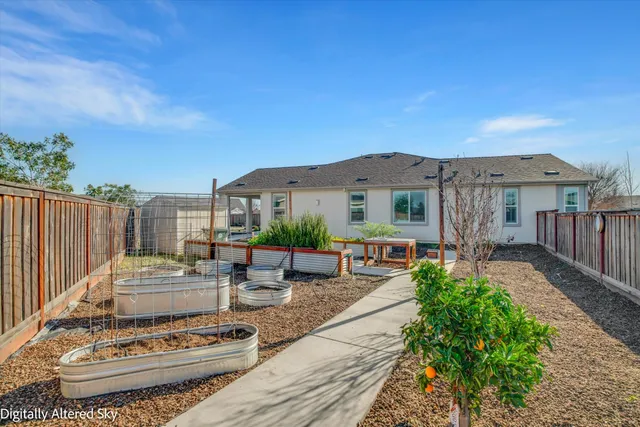 a view of a house with entertaining space