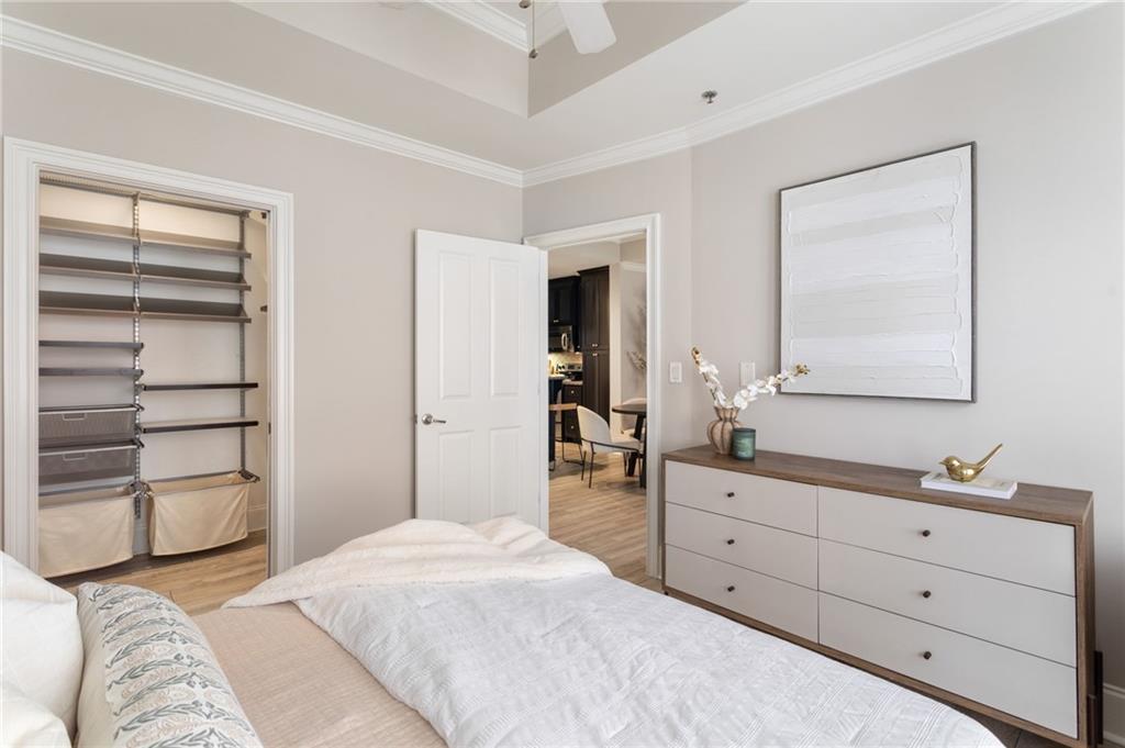2255 Peachtree Road Northeast, Unit 326 Atlanta, GA 30309 - Photo 12 of 37 a bedroom with a bed and a window