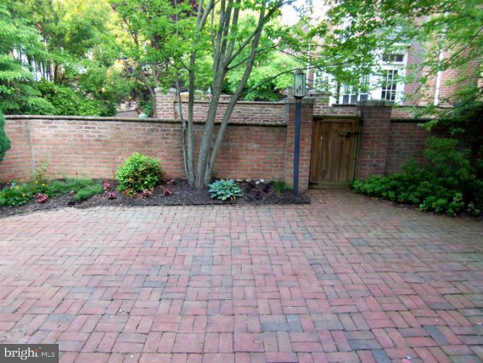 8405 Quarry Ridge Road Bethesda, MD 20817 - Photo 3 of 4 a view of a pathway with a patio