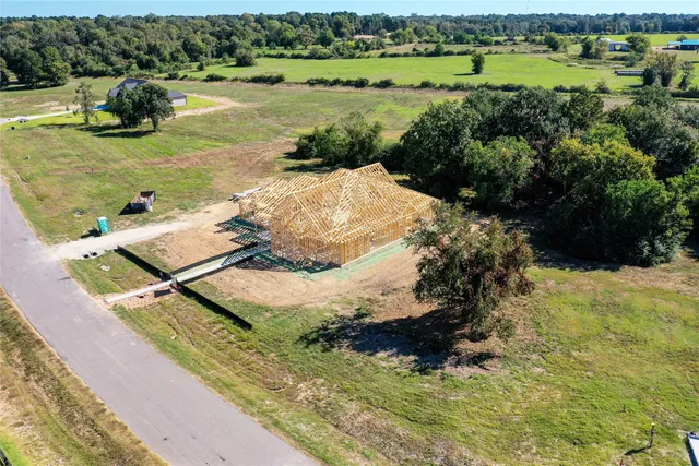 a view of a lake with a yard