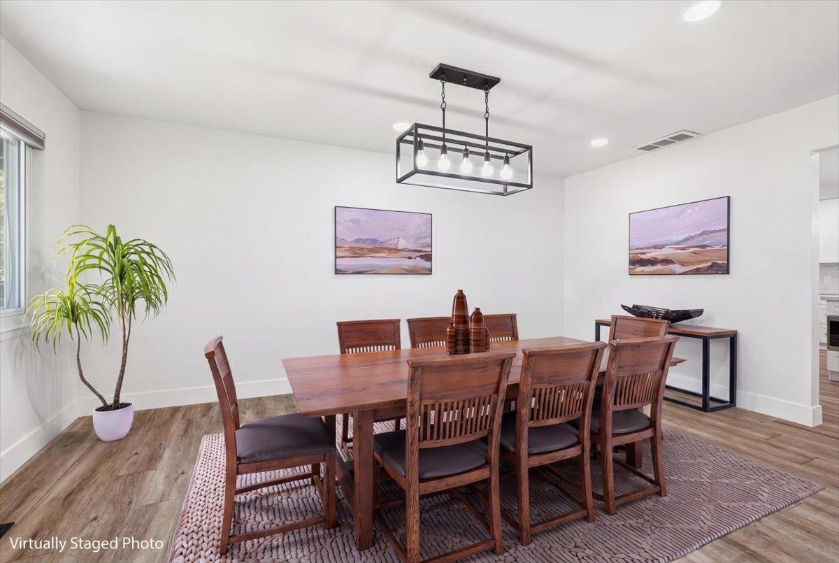 4849 Alexon Way Carmichael, CA 95608 - Photo 7 of 50 a view of a dining room with furniture window and wooden floor