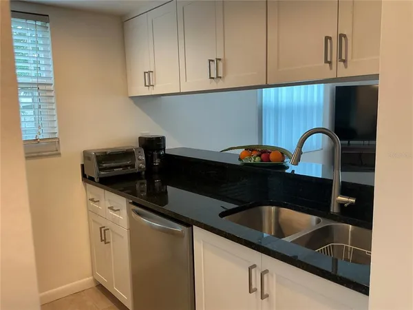 $1,600 | 2525 West Bay Drive, Unit E14, Belleair Bluffs, FL 33770