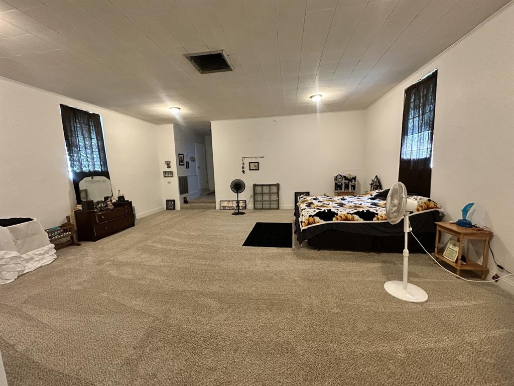 4914 Highway 507 Coushatta, LA 71019 - Photo 24 of 25 a bedroom with furniture and a wooden floor