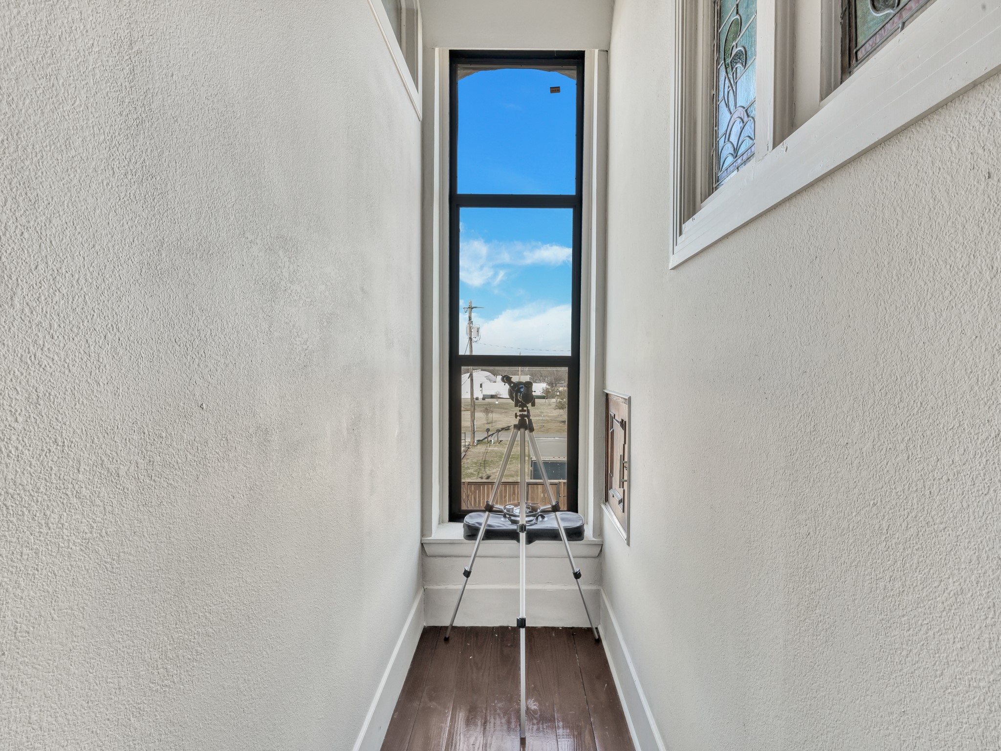 106 West Main Street Pilot Point, TX 76258 - Photo 27 of 46 view of a room with wooden floor and a wooden door