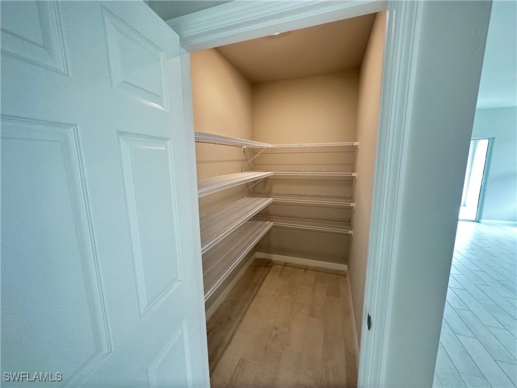 801 Serenity Lane LaBelle, FL 33935 - Photo 12 of 12 a view of walk in closet with empty racks