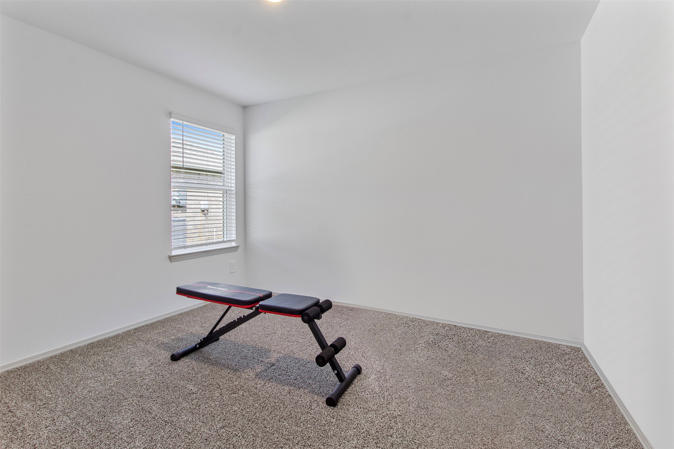 6685 Riplee Street Beaumont, TX 77713 - Photo 6 of 29 Bedroom with window blinds