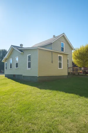 a view of a backyard with a garden