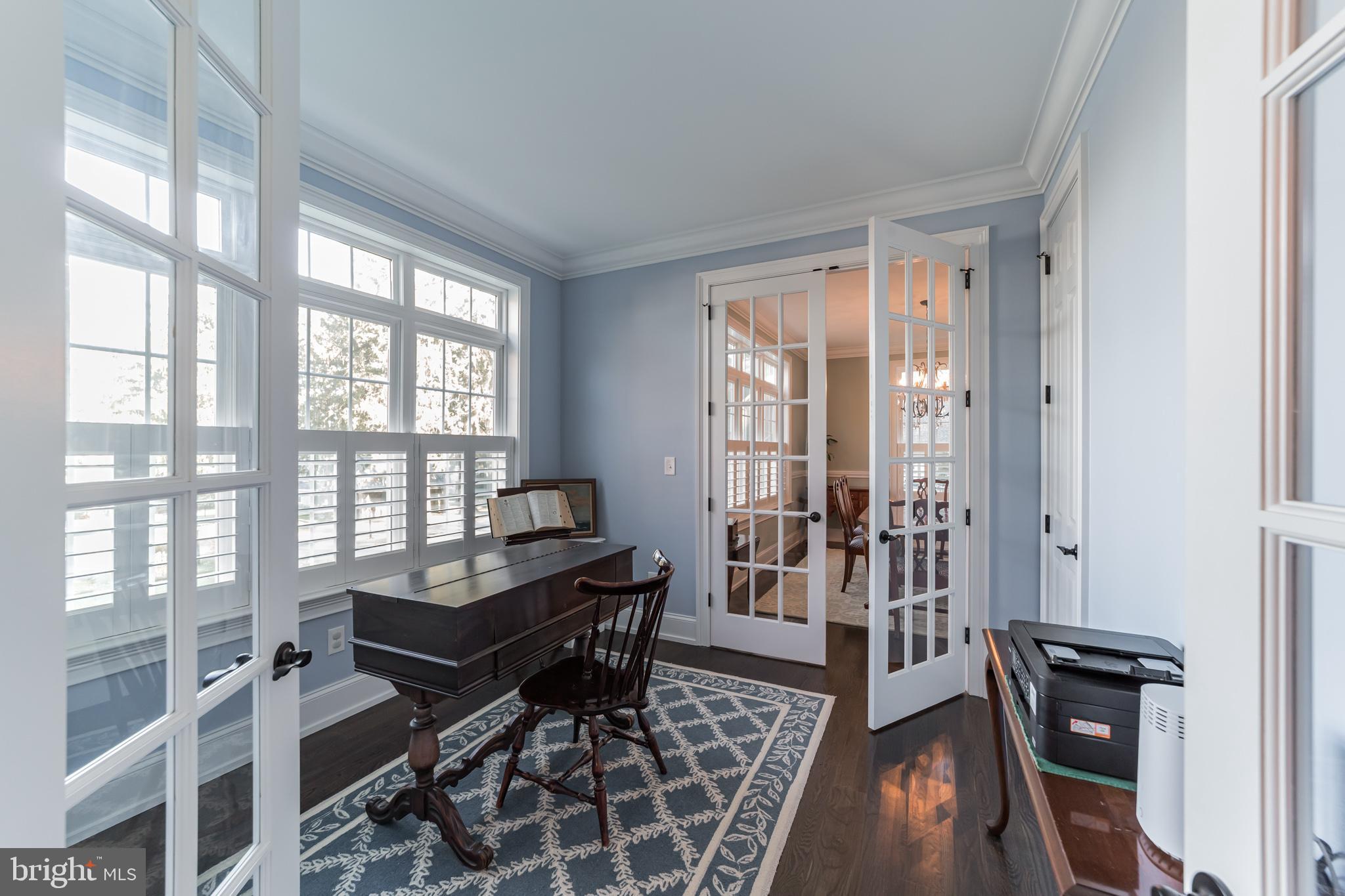 Library with Glass Doors - Off Entrance and Din Rm