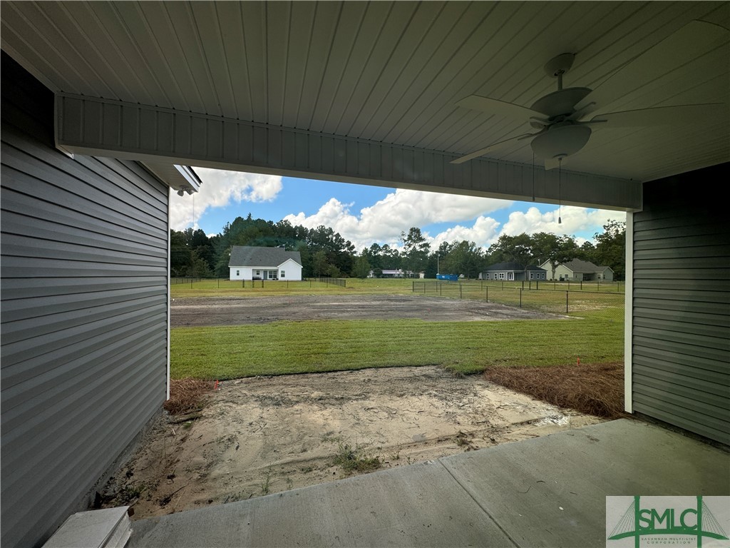 86 Owens Road Pembroke, GA 31321 - Photo 12 of 32 Covered rear porch. Grill patio being installed.