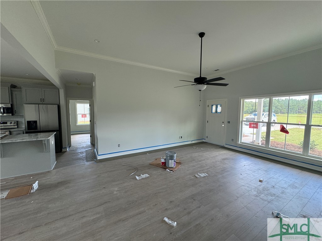 86 Owens Road Pembroke, GA 31321 - Photo 10 of 32 Great room with triple windows and lots of natural