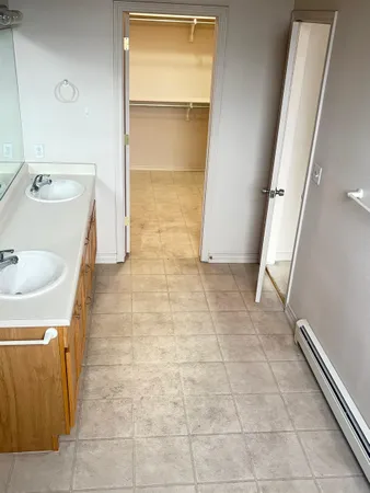 a view of an empty walk in closet
